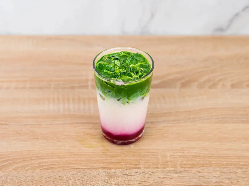 iced strawberry matcha latte layered drink