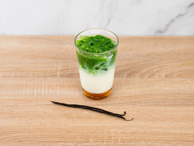 Whisking ceremonial matcha for latte