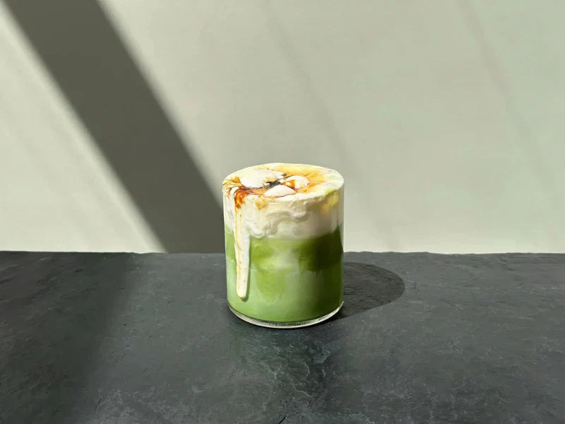 Crème brûlée matcha latte made with Oatly oat milk and Rude Health barista plant based milk
