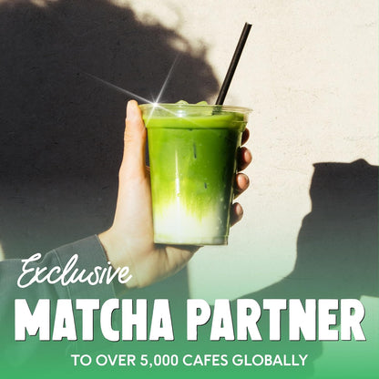 Hand holding a green matcha drink with text about an exclusive matcha partnership.